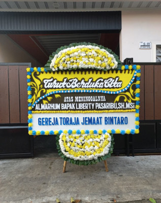 Papan Bunga Duka di Hubikiak